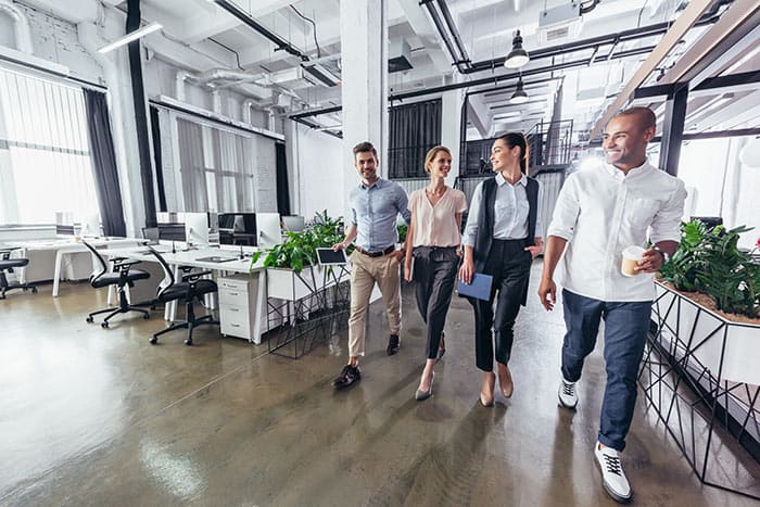 coworkers walking at the office