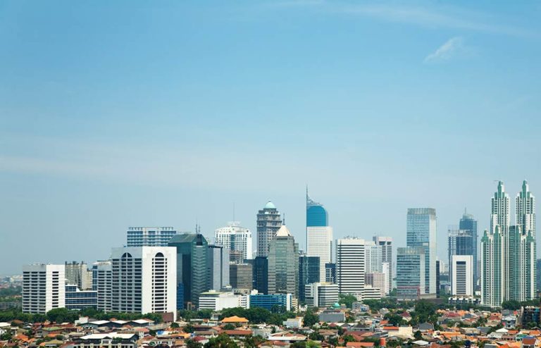 An image of telecommunications infrastructure and virtual phone numbers in Indonesia.